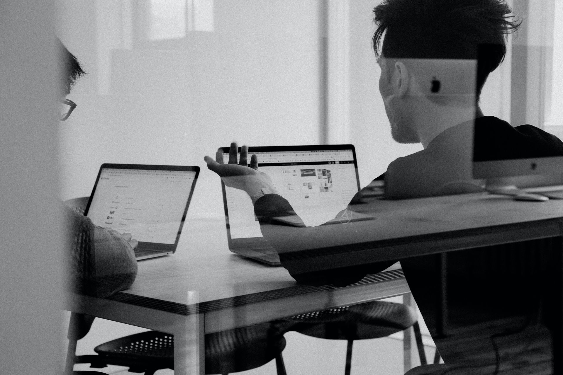 Professional planning work at a laptop